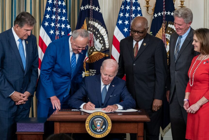 President Biden signing Inflation Reduction Act